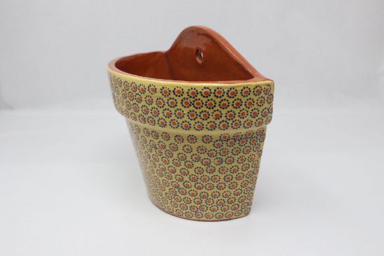 Imagen de Maceta de barro capulineada