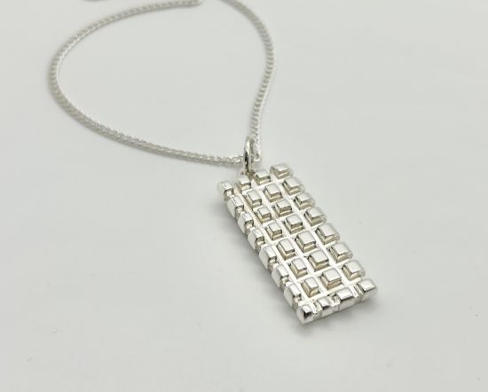 Imagen de Dije Cuadricula.